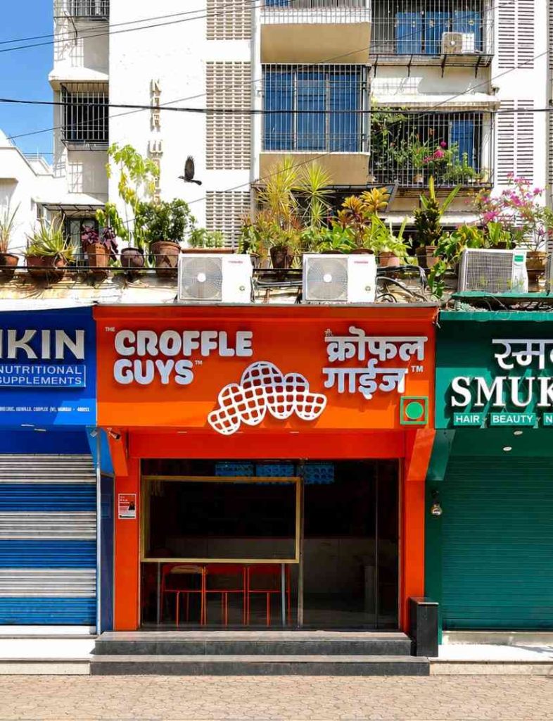 The Croffle Guys, vertical view of seating and wayfinding