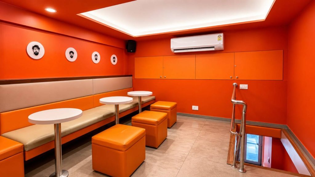 The Croffle Guys interior, signature orange palette