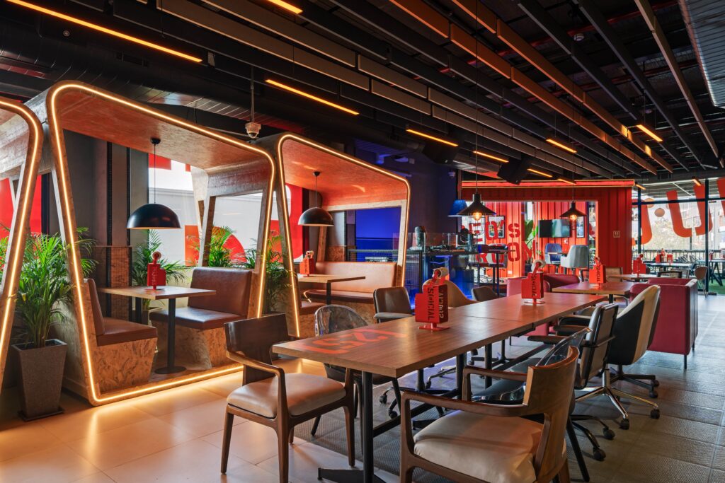 SOCIAL ECity — wide interior view of the anti-office layout